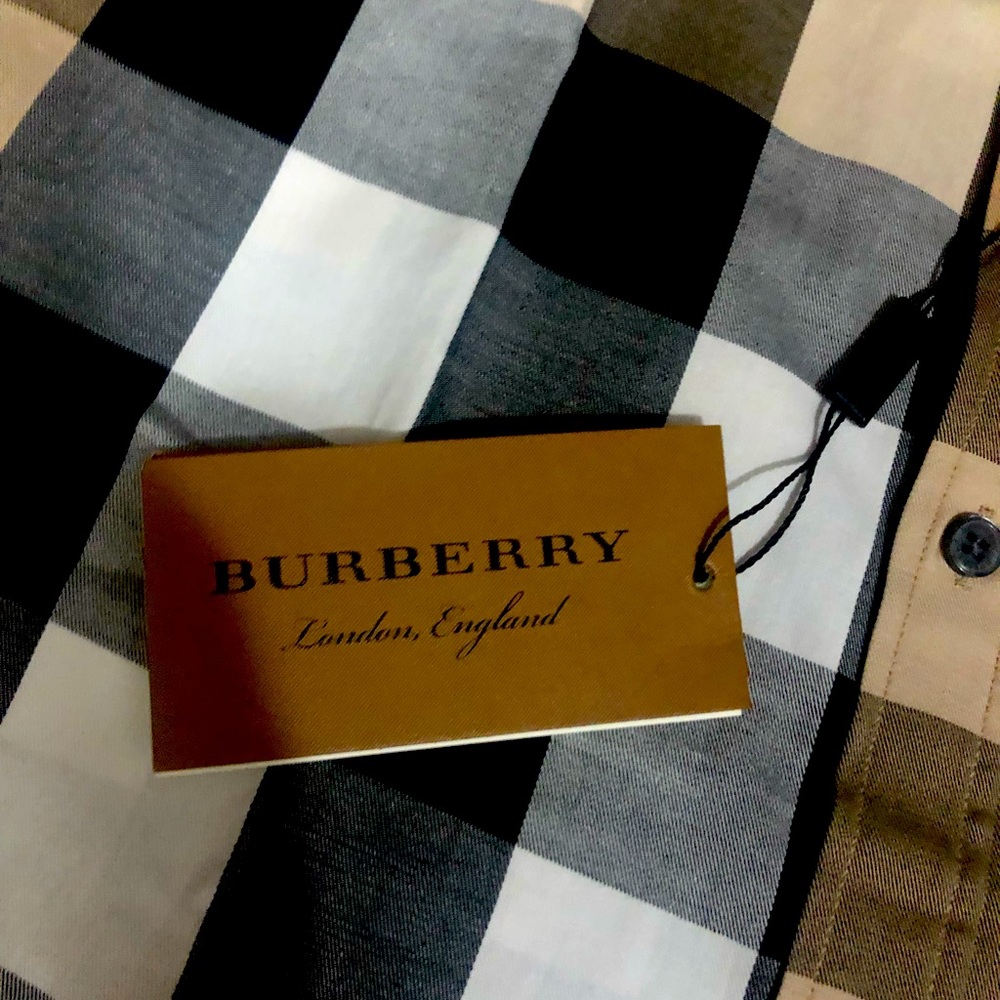NWT Burberry shirt.  Runs small, XXL (slim fit) fits like a M.